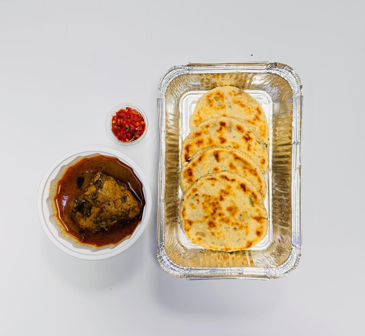 Sri Lankan Pol Roti coconut flatbread with chicken curry